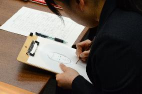 Tokyo police sketch artists vie for top award