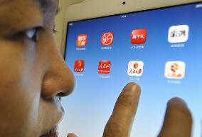 Chinese checks app allowing free access to news reports