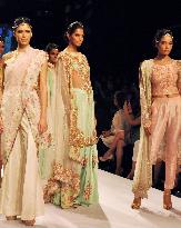Models pose at Pakistani designer's fashion show in Mumbai