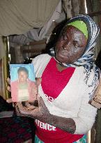 Victim of 2007 Kenyan riot shows her pre-riot picture