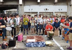 Locals perform at impromptu music ensemble event in Tokyo