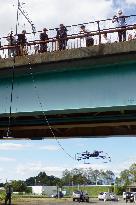 Camera-loaded flying device used to check bridge underside
