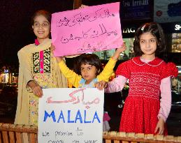 People in Pakistan celebrate Malala's Nobel win