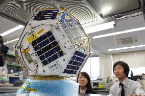 Students build extra-small satellite to orbit Sun