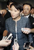 Trade minister meets with reporters over funds scandal