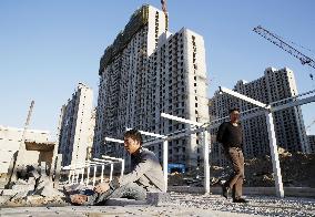 Slack real estate business takes toll on China's economy