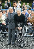 Emperor, empress acknowledge cheers at outdoor concert
