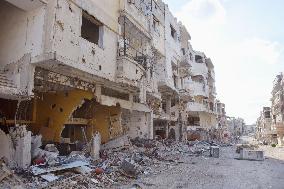 Syrian city street remains in ruins