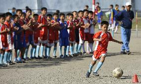 N. Korean pupils practice soccer in port city Chongjin