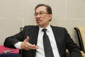 Malaysian opposition head brushes off sodomy charges