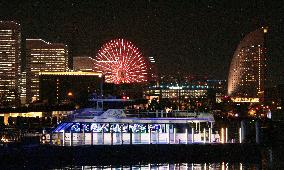 LED-lit ship sails through Port of Yokohama