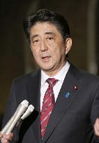 PM Abe receives reports from Ihara about talks with N. Korea