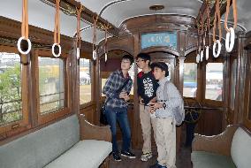 Interior of century-old wooden train carriage exhibited in Nara
