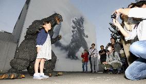 Commemorative photo taken with 'Godzilla'