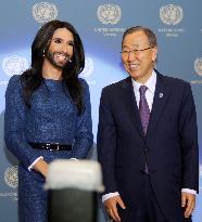 Drag singer Wurst, U.N. chief Ban stand on stage