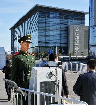 Chinese police stand guard at venue for APEC meetings