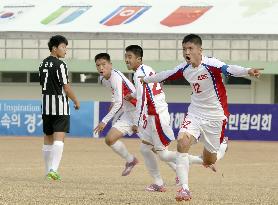 N. Korean boys react to goal in U-15 soccer in S. Korea