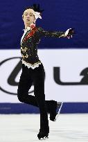 Hanyu manages silver after warm-up collision