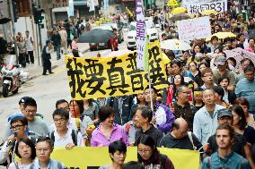 Hong Kong protesters march on Beijing's liaison office