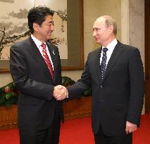 Japan's Abe, Russia's Putin hold talks in Beijing