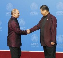 China's Xi and Russia's Putin at APEC summit