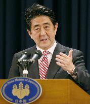 Abe attends press conference following APEC summit