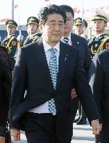 Abe leaves for Myanmar from China