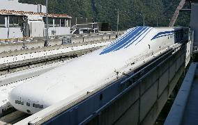 Maglev train unveiled at testing center west of Tokyo