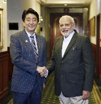 Abe, Modi meet in Brisbane