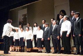Ex-classmates of abduction victim sing at concert