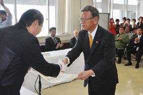 Okinawa gov.-elect receives election certificate