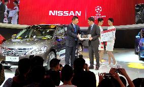 Michael Owen appears in Nissan's booth at Guangzhou auto show