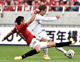 Gamba Osaka's Kurata scores in game against Urawa