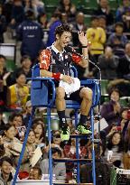 Japan tennis star Nishikori smiles on umpire chair