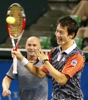 Japan tennis star Nishikori smiles during charity match