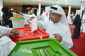 Man casts ballot in Bahrain parliamentary election
