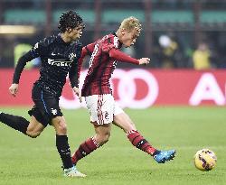 AC Milan's Honda in action in Milan derby
