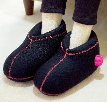 Pola puts shoe-shaped foot warmer on sale