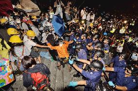 Police, protestors clash near HK gov't office