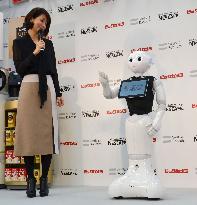 Softbank's 'Pepper' robot sells Nestle coffee machine