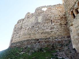 Bullet holes on Syrian Crac des Chevaliers castle walls