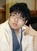 Student-cum-pro 'shogi' player wins 'Ryuo' title