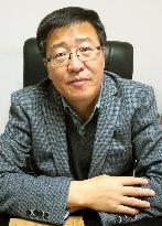 Peking University professor Yan in interview