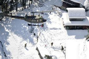 Wide areas of Japan hit by heavy snow