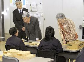 Emperor, Empress at vocational center for disabled