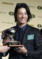 Golfer Ishikawa wins 'Most Impressive Player' award