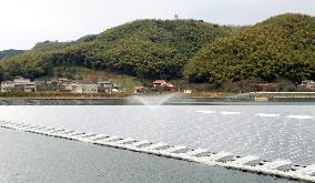 Mega solar power system built on water in west Japan