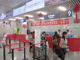 Chinese rail station used for air passenger check-in