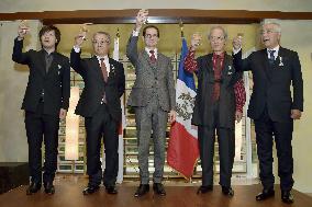Japanese winners of French orders of arts and letters toast