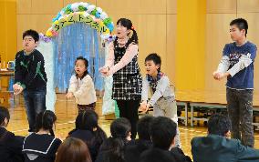 Fukushima children perform play about home
